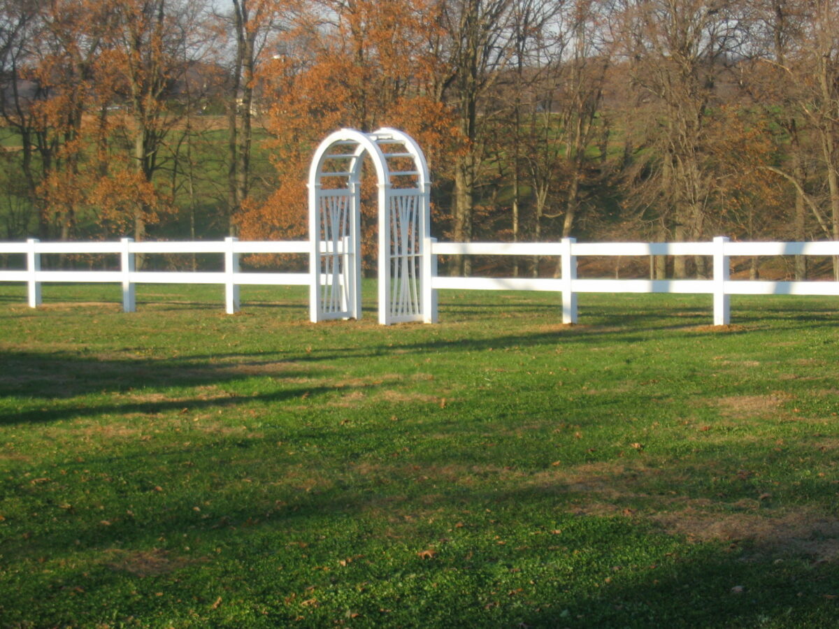 rail fence with arbor