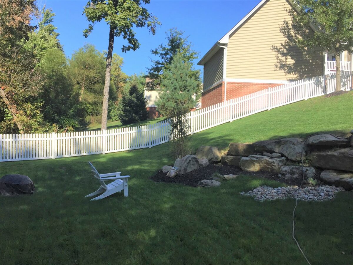 vinyl picket fence in yard