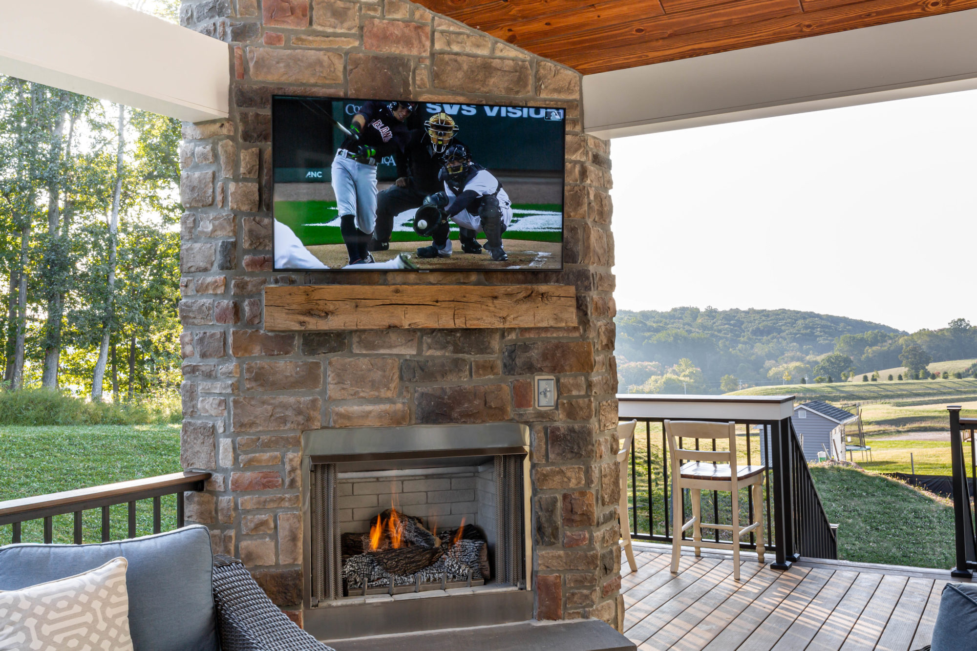 Composite deck with fireplace