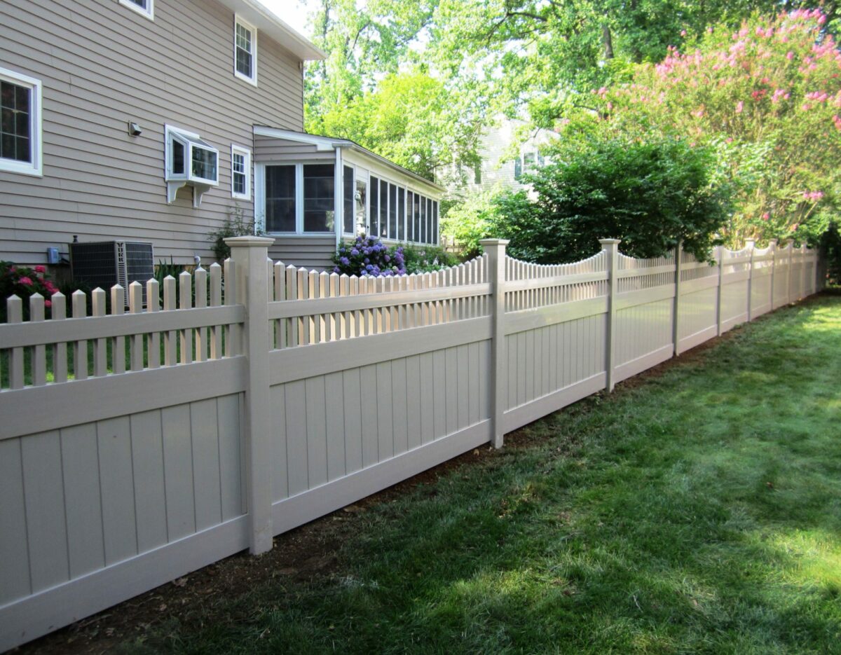 Vinyl privacy fence in back yard