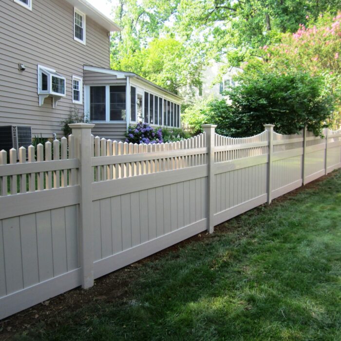 Vinyl privacy fence in back yard