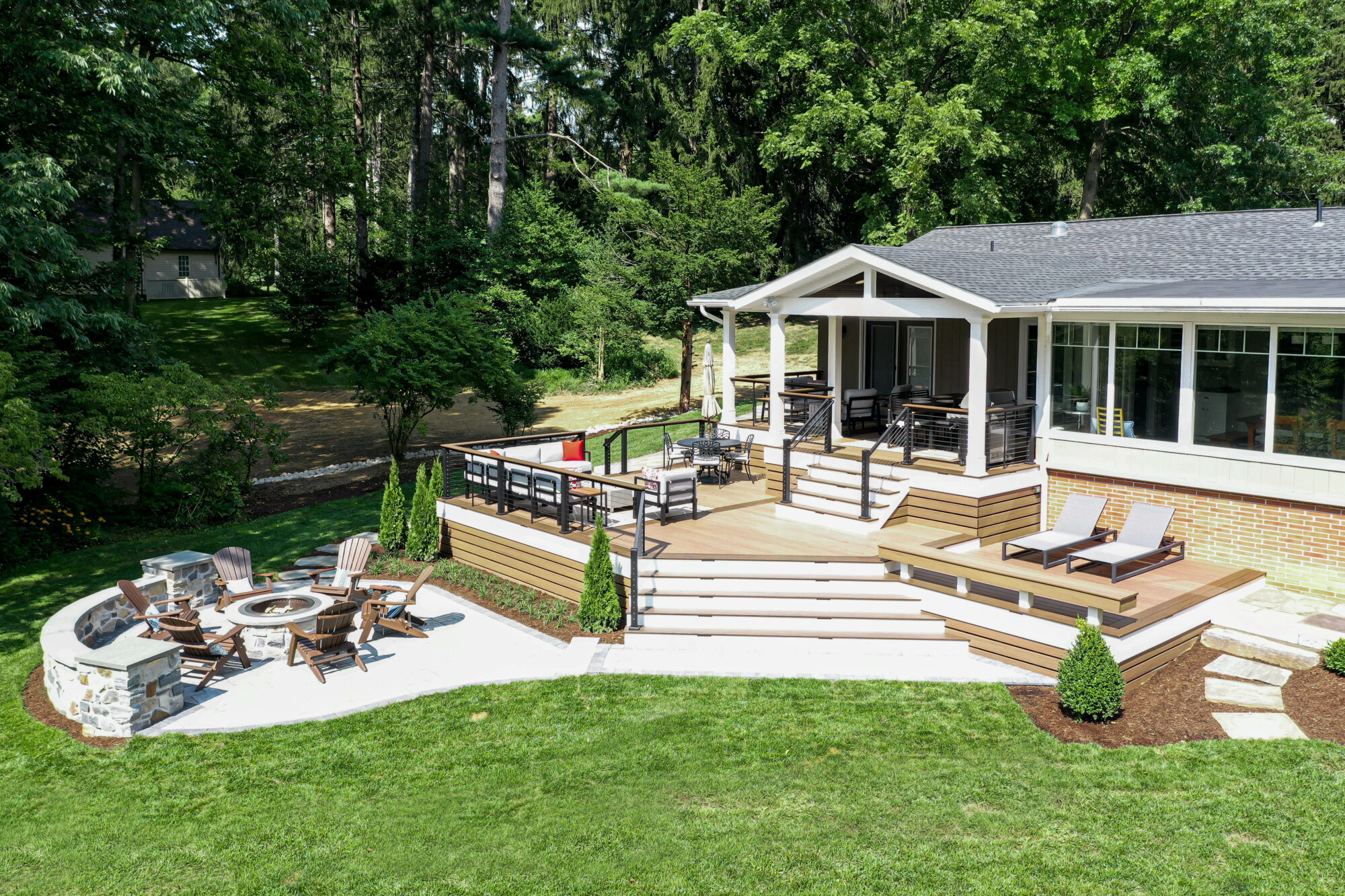 Multi-Level deck, Modern Deck, Pecan, Mocha, Drink Rail, Cable Railing, Modern Railing, TimberTech, Decking, outdoor living, Techo block, patio, fire pit, breeo, roofed deck, porch, cover porch, pine ceiling, outdoor heaters, outdoor dining,