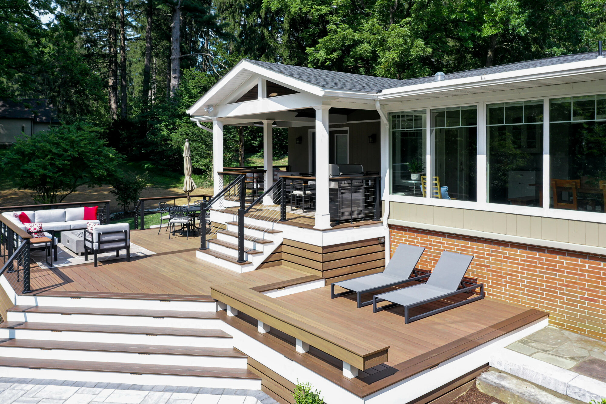 Multi-Level deck, Modern Deck, Pecan, Mocha, Drink Rail, Cable Railing, Modern Railing, TimberTech, Decking, outdoor living, Techo block, patio, fire pit, breeo, roofed deck, porch, cover porch, pine ceiling, outdoor heaters, outdoor dining,