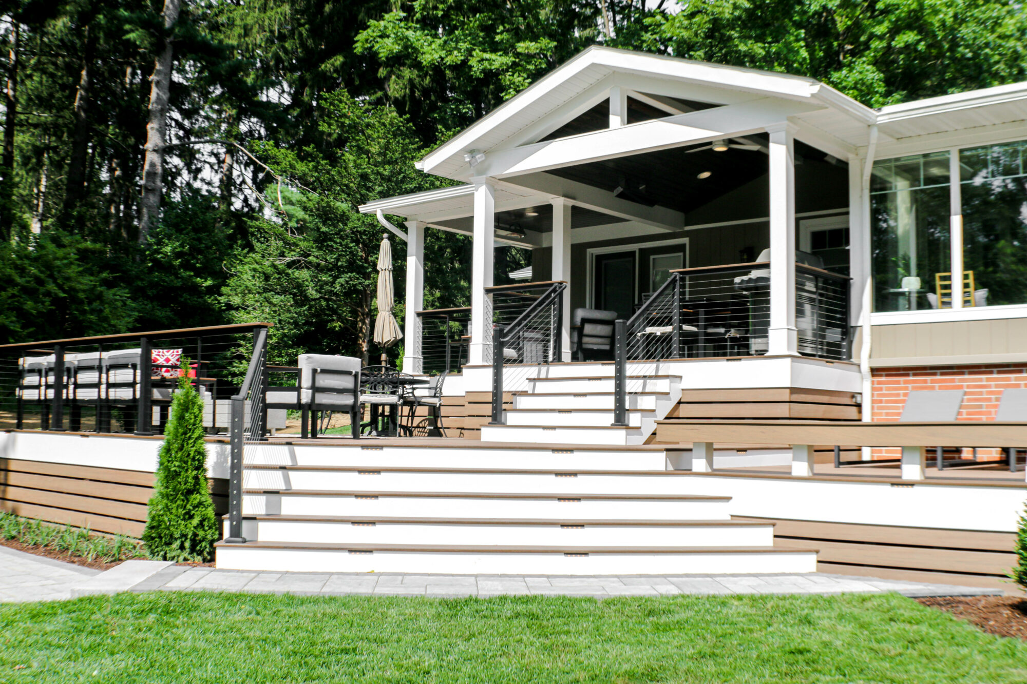 Multi-Level deck, Modern Deck, Pecan, Mocha, Drink Rail, Cable Railing, Modern Railing, TimberTech, Decking, outdoor living, Techo block, patio, fire pit, breeo, roofed deck, porch, cover porch, pine ceiling, outdoor heaters, outdoor dining,