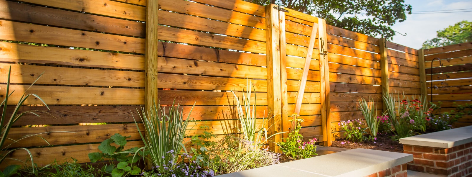 Custom residential wood fence built and installed at home by Ardmore fence company Integrous
