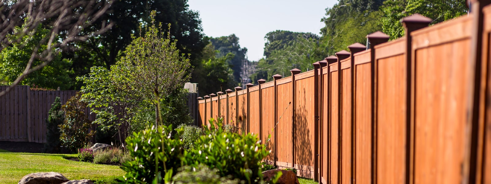 Custom residential wood fence built and installed at home by Chester County fence company Integrous
