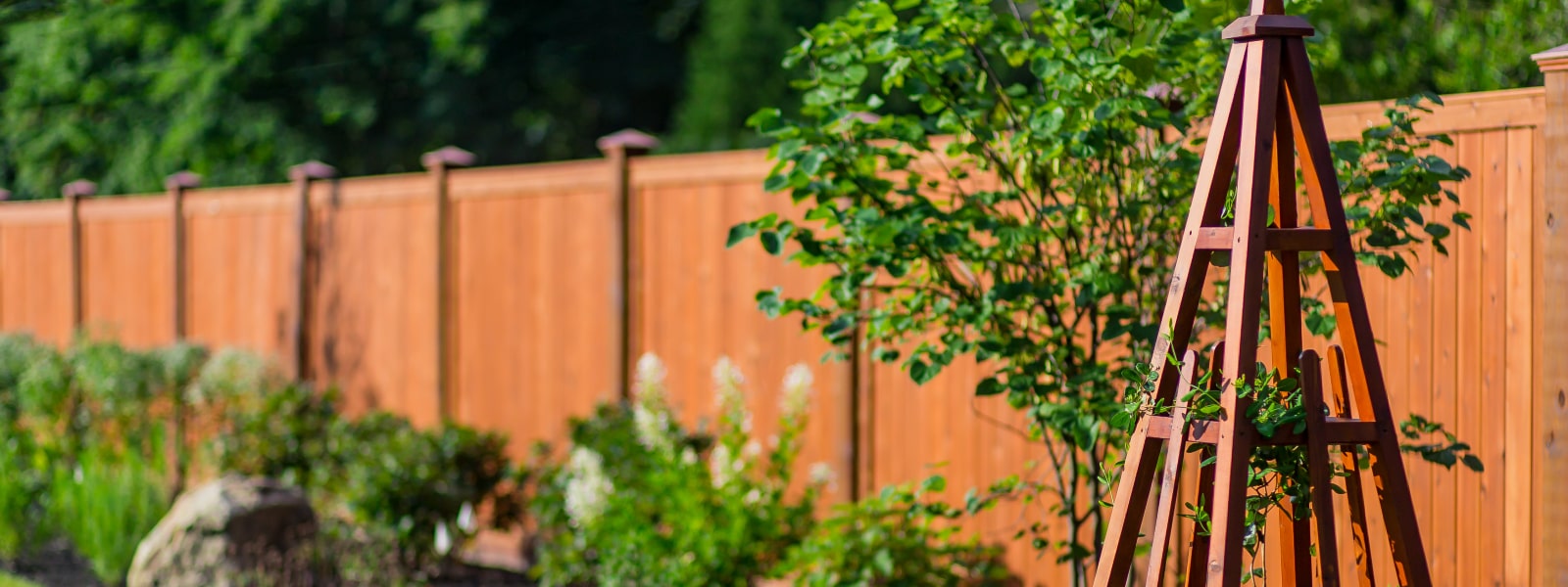 Custom residential wood fence built and installed at home by Phoenixville fence company Integrous