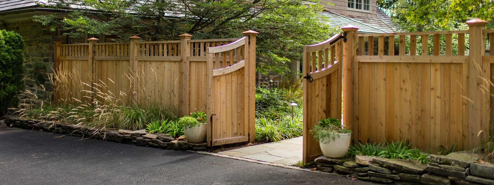 Custom wood fence set up and installed at home by West Chester fence company Integrous