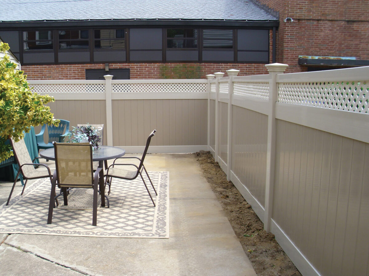 two tone vinyl privacy fence with lattice top