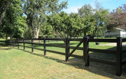 black vinyl rail fence with gate