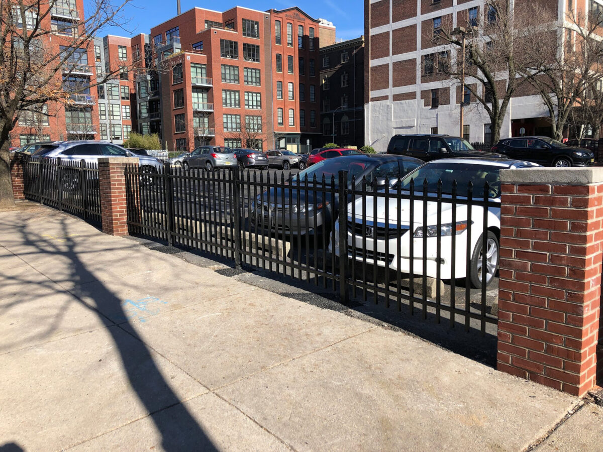 Ornamental aluminum fence with pillars