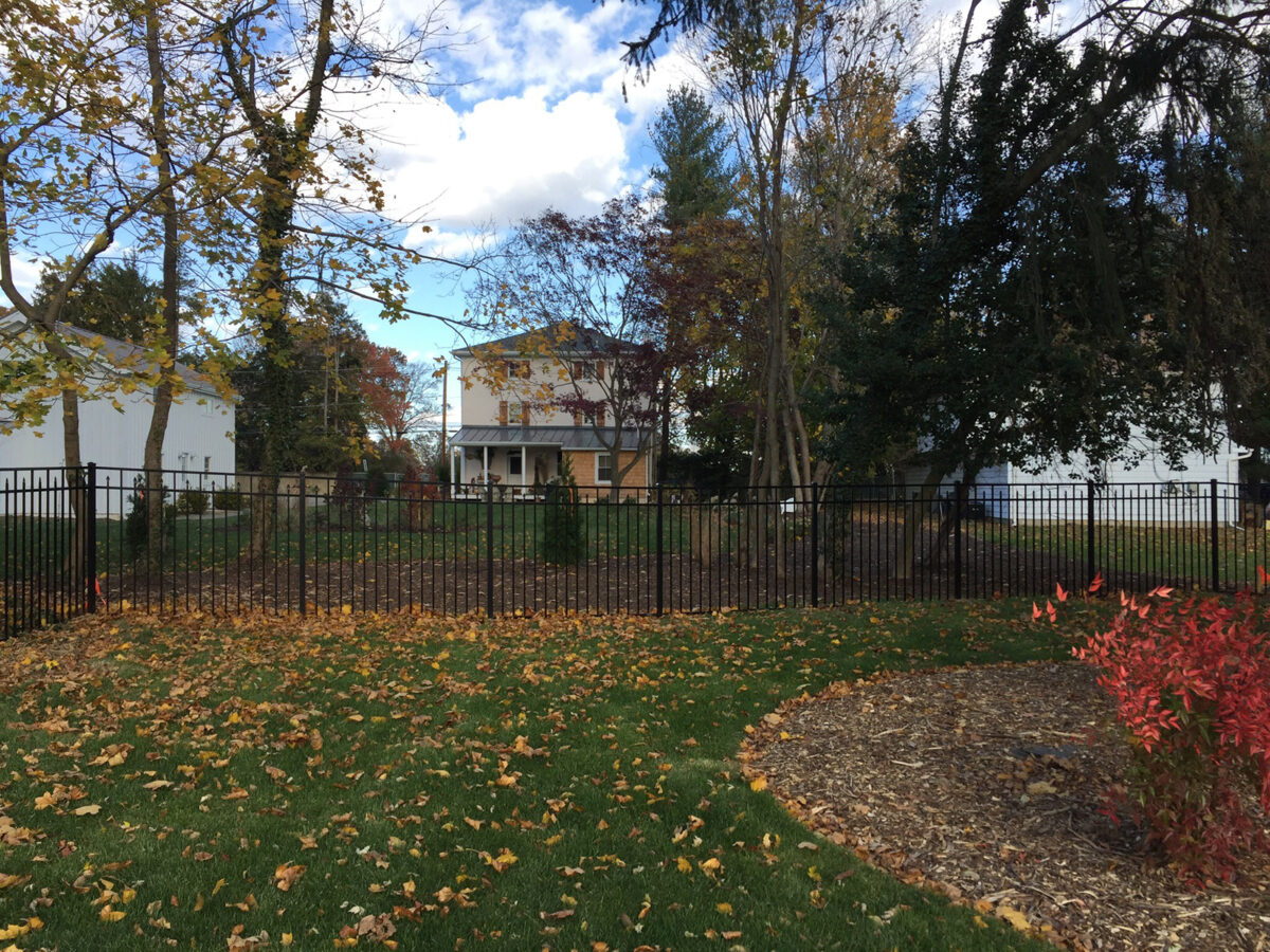 Ornamental aluminum fence in yard