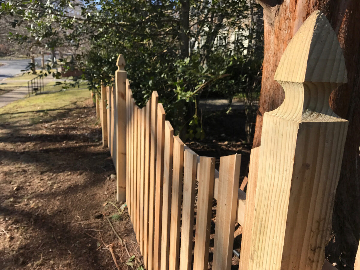 picket fence with french gothic posts