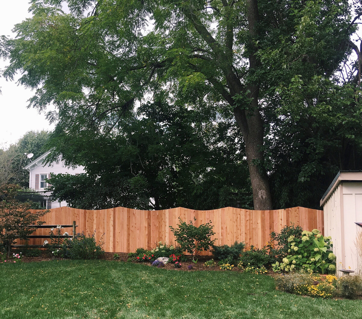 concaved wooden privacy fence