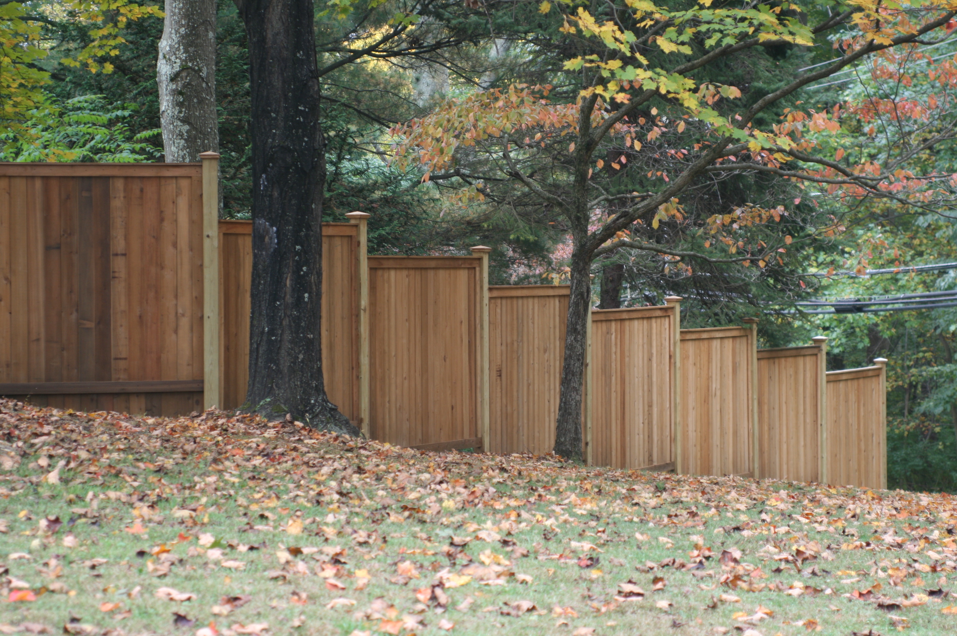 stepped wood sound abatement fence