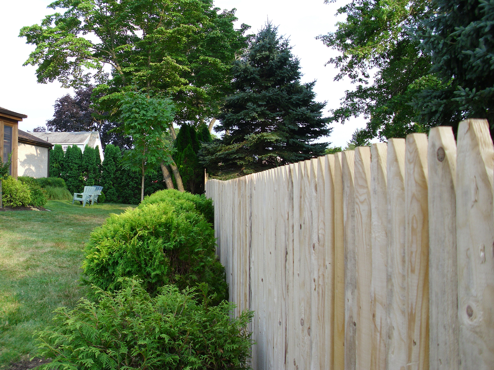 Stockade fence in yard
