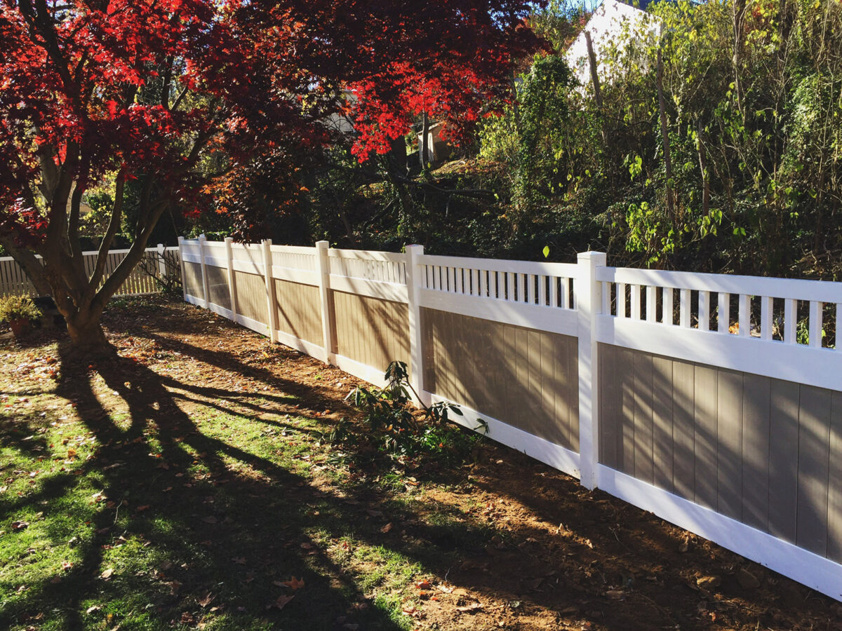 vinyl privacy fence in white and khaki colors