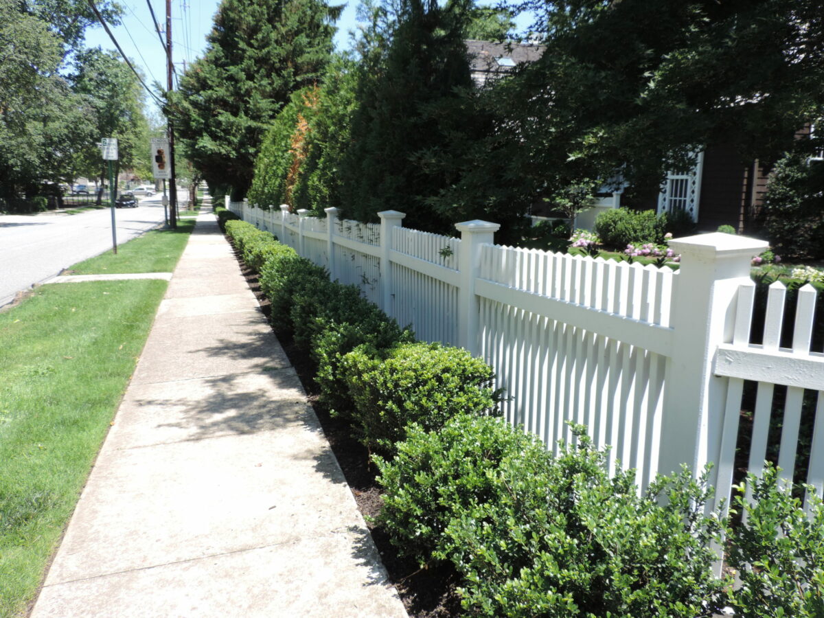 Wood fence with post caps