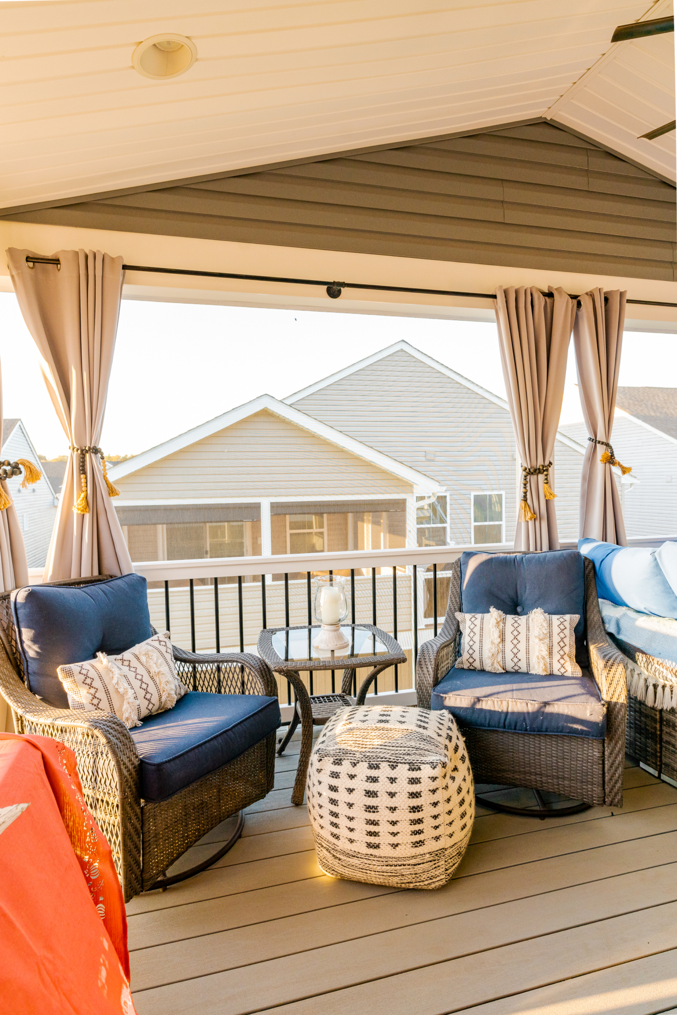 image of a deck with a screened in roof in coatesville pa built by integrous fences and decks featuring a screened in roof area an open deck timbertech decking white vinyl railing with black aluminum balusters and one set of stairs to grade