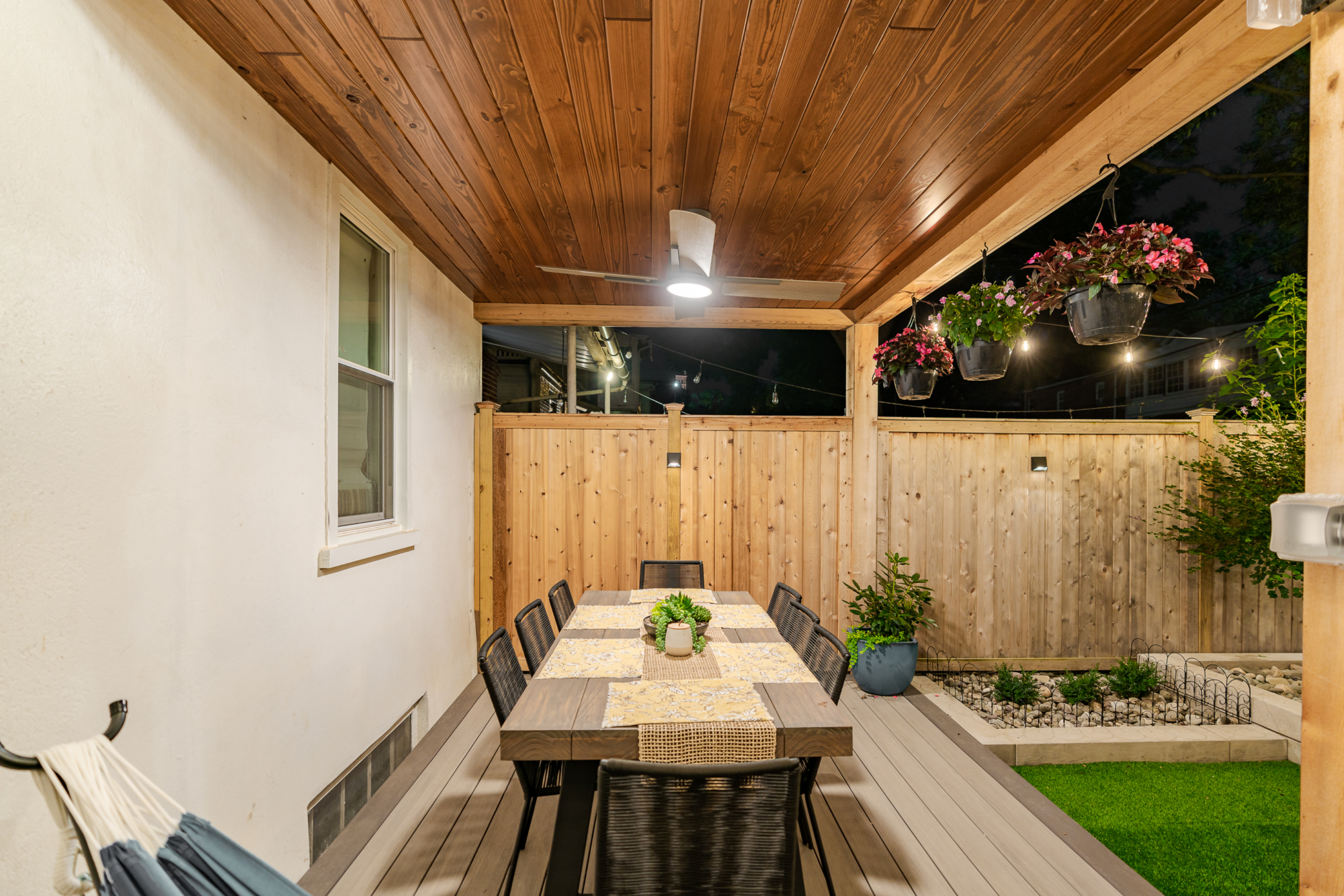 image of a backyard in lancaster city pa built by integrous fences and decks featuring two cedar pergolas multiple decks and beautifully designed landscaping