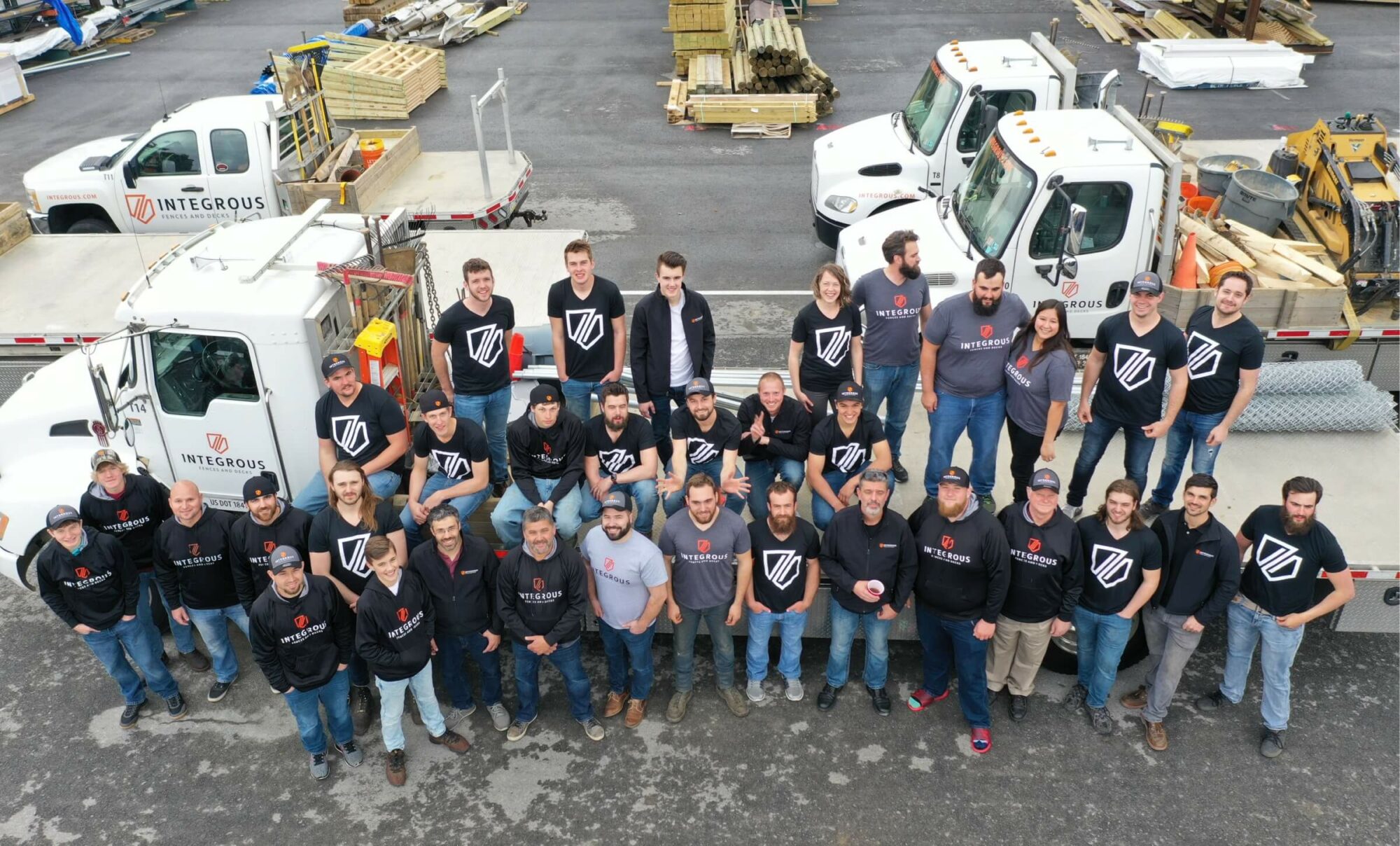 Company picture in front of truck