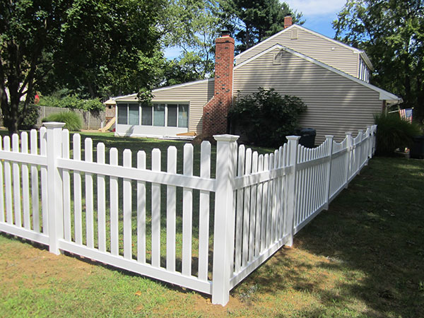 4' tall Freehold picket fence style white dog eared picket fence with New England post caps